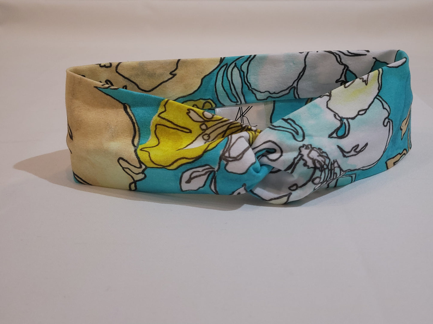 Haarband mit Blumen in türkis